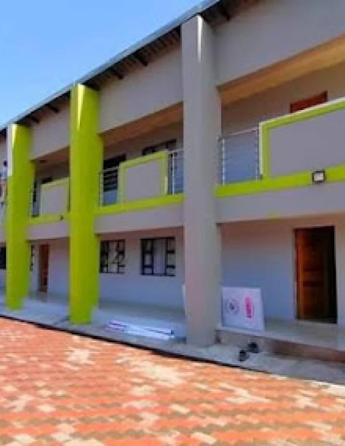 Apartment building with bright green exterior accents