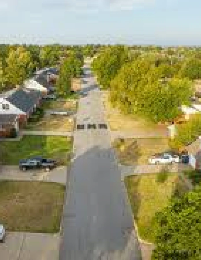 Aerial view of a tree-lined residential neighborhood